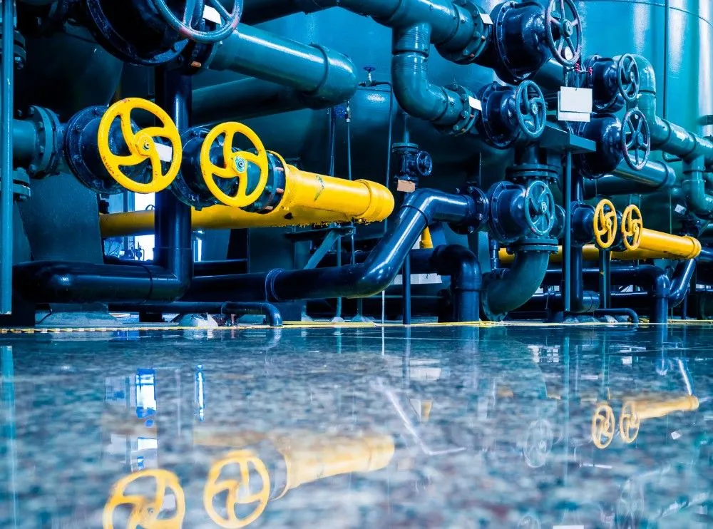 Corrosion-resistant brass components for water treatment and filtration systems