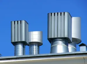 Clean air system for reducing emissions in brass manufacturing facilities
